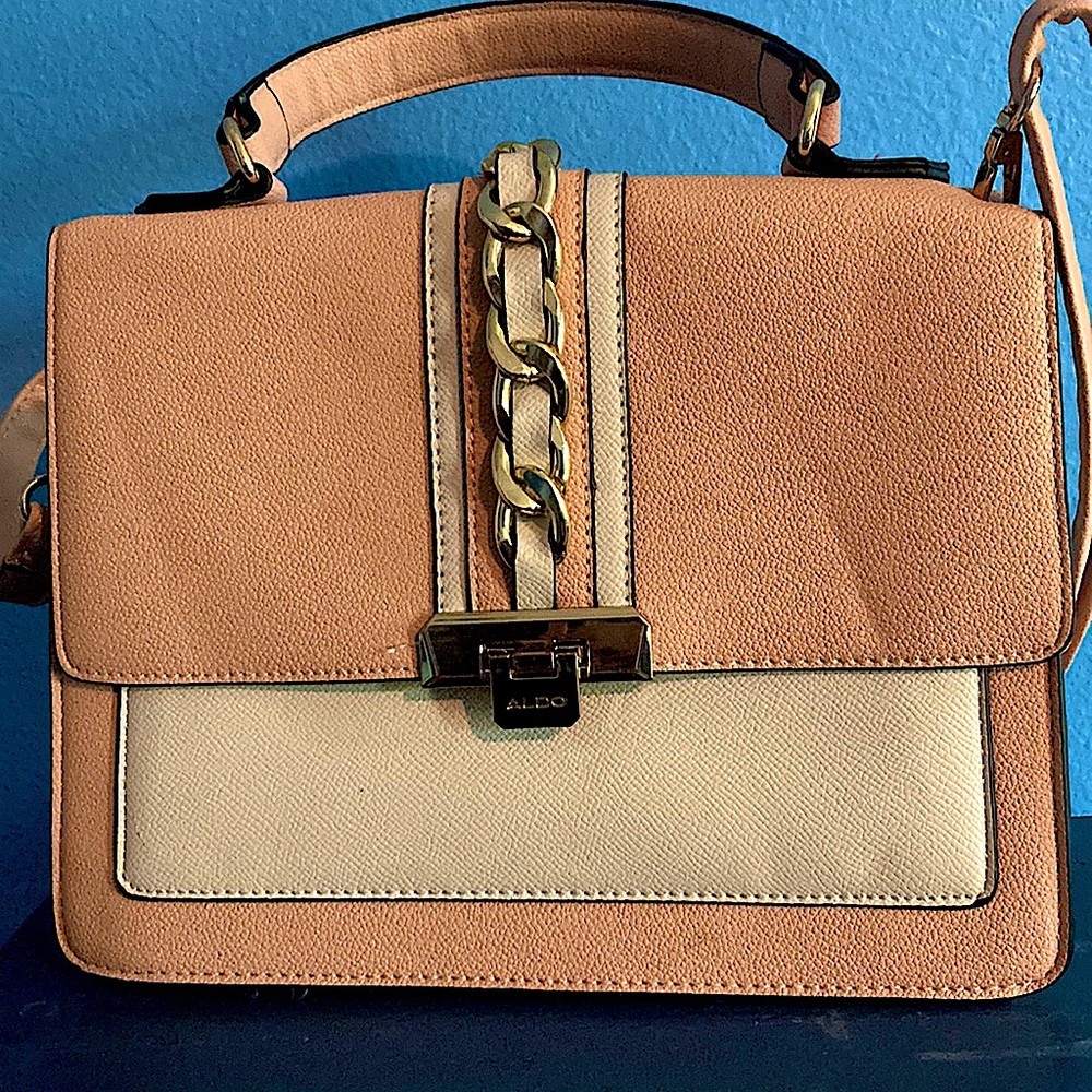 A cute pink and gold purse just for you:)